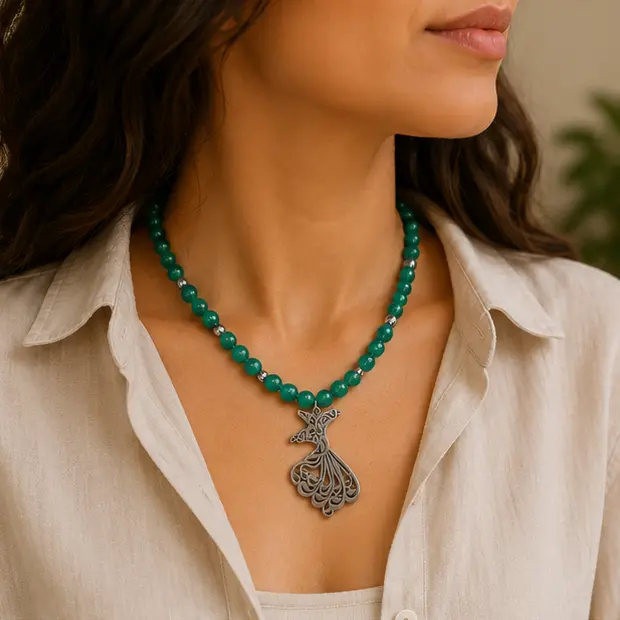 Emerald Whirling Dervish Pendant 2.webp